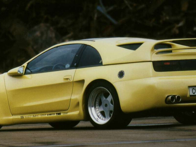 Nissan Z IV (Z32), купе, светло-жёлтый, вид три четверти сзади — фото 18418